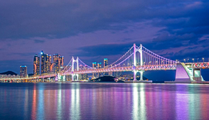 A bridge with lights at night Description automatically generated with low confidence