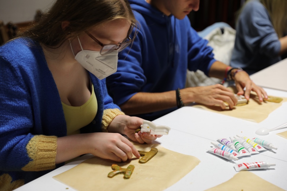 A picture containing table, person, indoor Description automatically generated